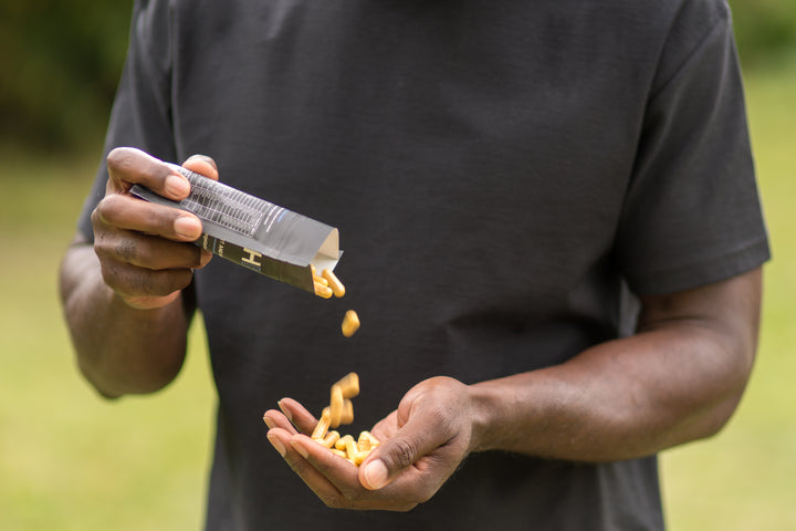 Patrick pouring supplements into his hands